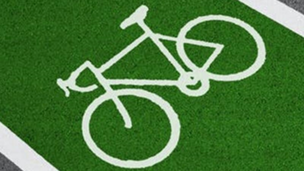 Plaatje van een groen fietspad